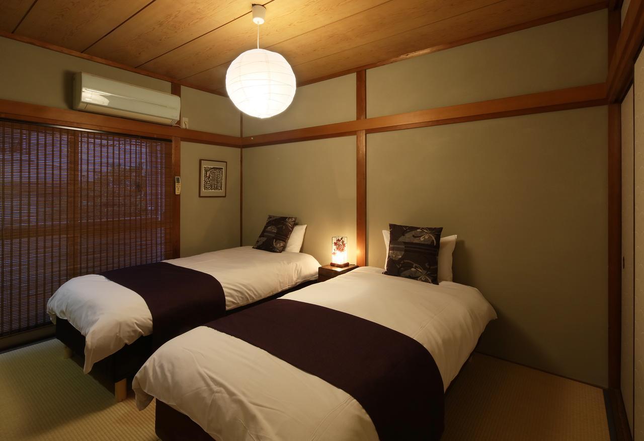 Chikyuutabikazoku Usj Appartement Osaka Buitenkant foto