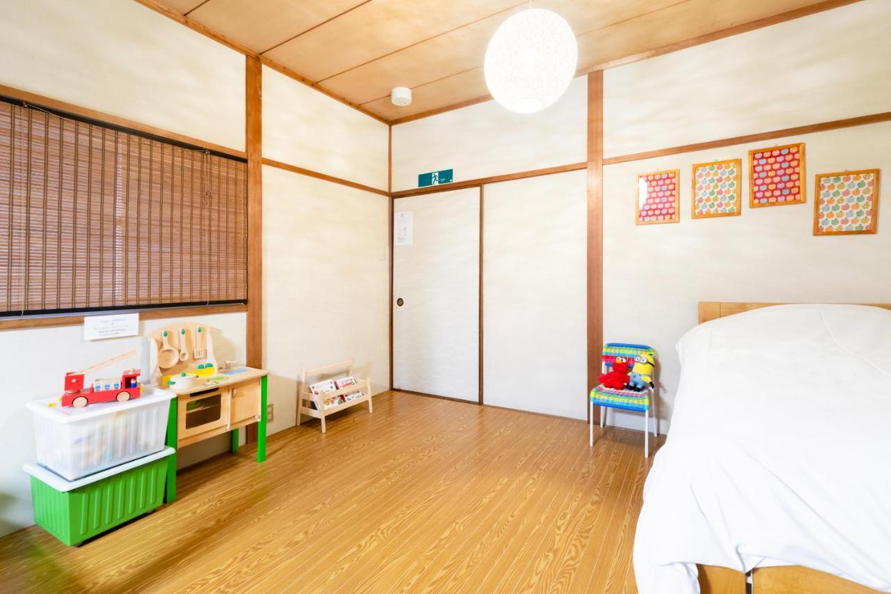 Chikyuutabikazoku Usj Appartement Osaka Buitenkant foto