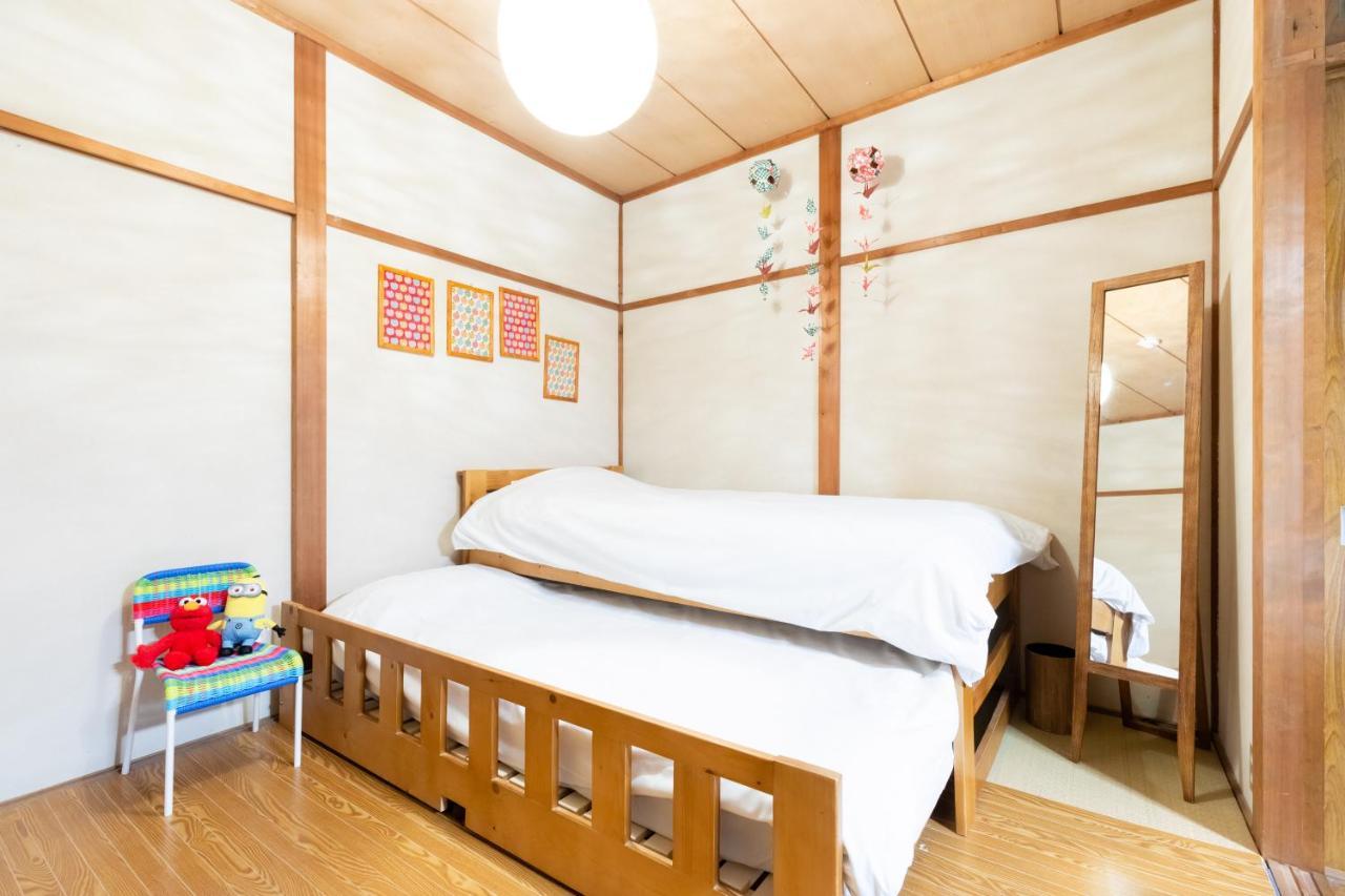 Chikyuutabikazoku Usj Appartement Osaka Buitenkant foto