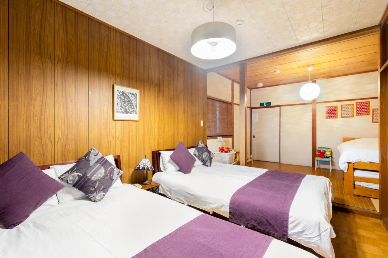 Chikyuutabikazoku Usj Appartement Osaka Buitenkant foto