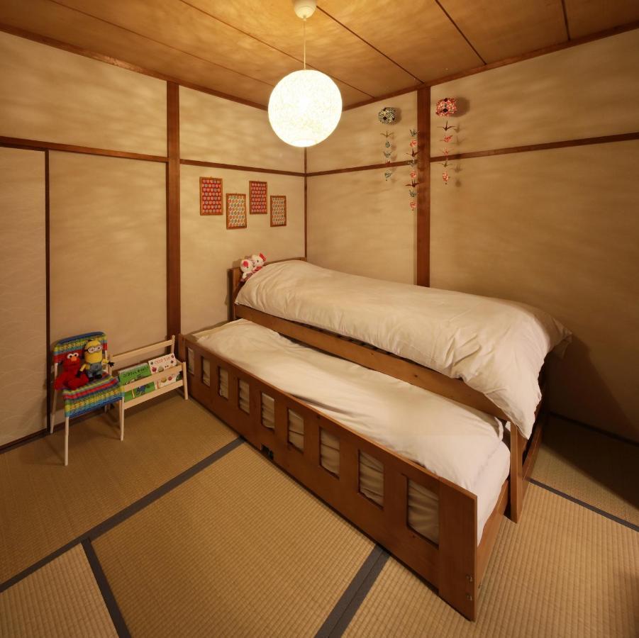 Chikyuutabikazoku Usj Appartement Osaka Buitenkant foto